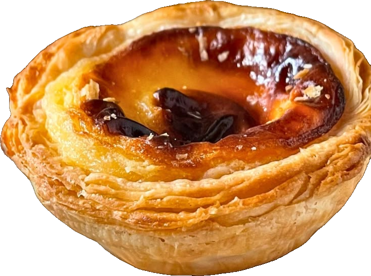 Two pastéis de nata with caramelized custard tops